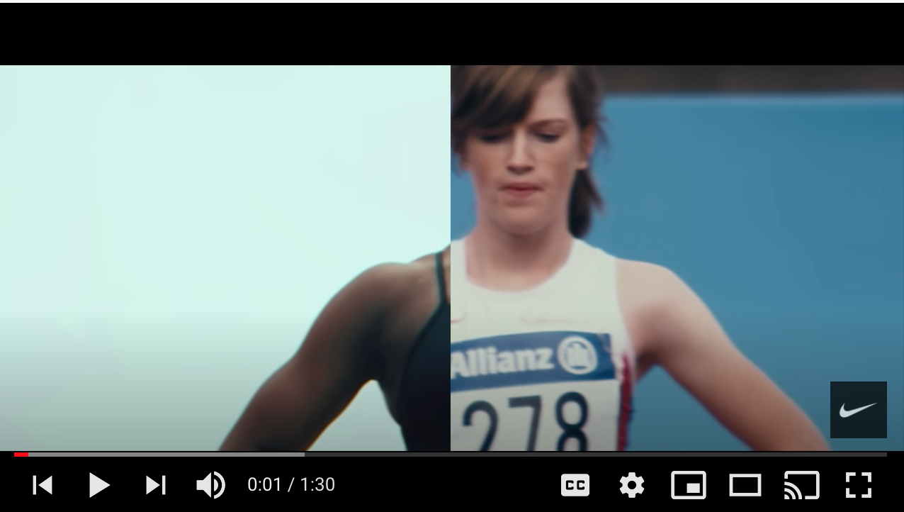 Woman standing before starting a race. Nike ad to show strength of American spirit.